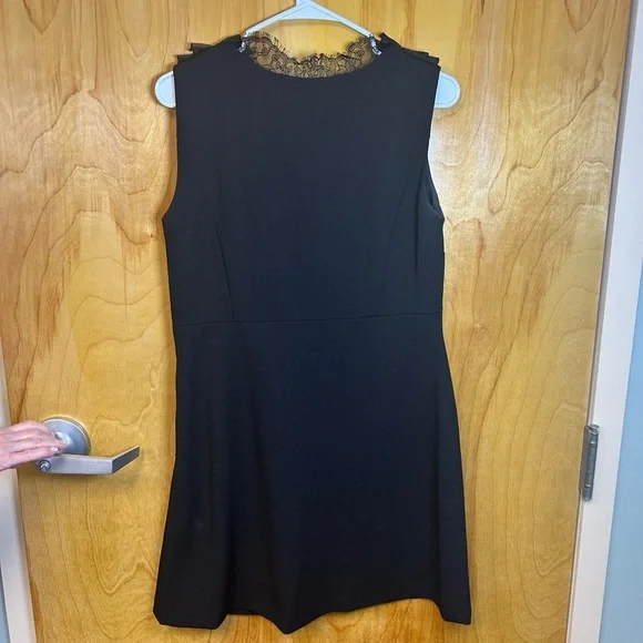 Black Ruffled Sleeveless Top - Picture 2 of 4